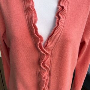 100% Small Cashmere cardigan with ruffled front. Beautiful pink/peach color.